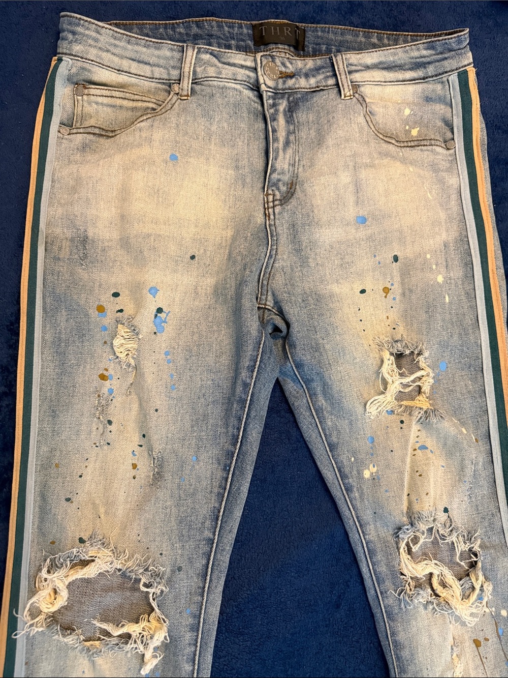 Distressed Light Wash Jeans with Side Stripes